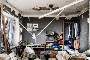 A destroyed bedroom in a home hit by shelling during fighting in the early stages of teh Russian invasion.
