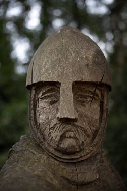 A wooden carving of an Anglo-Saxon or Norman soldier near the town of Battle which is near the battlefield site of the Battle of Hastings (14 October 1066).