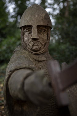 A wooden carving of an Anglo-Saxon or Norman soldier near the town of Battle which is near the battlefield site of the Battle of Hastings (14 October 1066).