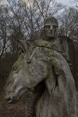 A wooden carving of a mounted Anglo-Saxon or Norman soldier near the town of Battle which is near the battlefield site of the Battle of Hastings (14 October 1066).