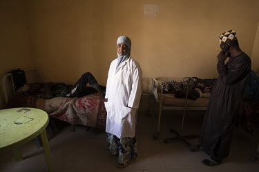 A nurse working on a ward in the clinic at Teacher's Village IDP camp, home to 20,000 civilians who fled the conflict with Boko Haram.