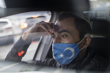 Alimcan Turdi, an ethnic Uyghur man, in a car after taking part in a demonstration in front of the Chinese embassy in Istanbul protesting human rights abuses against Uyghurs in Xinjiang.