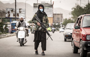 A Taliban security person at a checkpoint.
