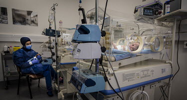 A baby is treated in an incubator in the neo-natal intensive care unit at Karantina Public Hospital. The hospital has only a few days of diesel in reserve. If the generators stop, these babies die.  F...