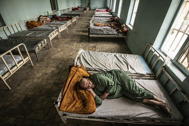 A patient sleeps in a dormitory at the Ibn Sina drug addiction hospital.