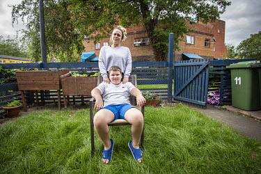 Junior Tams (9) with his mother Mary-Jane (34) outside their home on the Byker Estate. Mary-Jane says that since the COVID-19 lockdown began, Junior's education has worryingly regressed. Like so many...