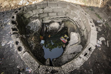 Leaves and rubbish float in an open water well in Kanyama Compound (population 400,000). When the area floods, sewage seeps down into the well.  Female Genital Schistosomiasis (FGS) is a waterborne pa...