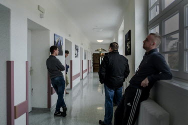 Partners of women who have travelled from Poland to undergo terminations at a clinic in Germany wait in a corridor at an abortion clinic. Most Polish women coming for an abortion are accompanied by th...