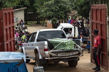 A vehicle carries the coffin containing th ebody of Elodie Kitsama (19), who died from ebola the previous day at the Beni Ebola Treatment Centre, to a burial ground. Elodie, who was still at school, d...