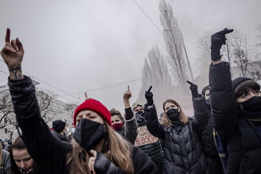 On the anniversary of martial law introduced in the country 39 years ago by the communist Polish People's Republic, protesters rally near police lines blocking the district of Zoliboz, demanding the g...