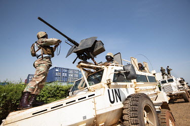 MONUSCO (United Nations Organization Stabilization Mission in the Democratic Republic of the Congo) troops about to go on patrol in a convoy of armoured UN vehicles.