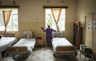 A patient looks out of a window on a ward at the Panzi Hospital which was founded by Congolese gynaecologist Dr Denis Mukwege in 1999. Mukwege specialises in treating women who are victims of rape as...