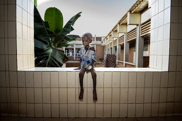 Rasmata Cisse (5), who is being treated for malnourishment in the Kaya Regional Hospital's nutrition unit. The hospital is operating at over 100% capacity, in many cases there are three patients per b...