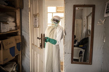 Hygienist Bertrand Karumba (33) wearing full personal protective equipment as he prepares to enter the Ebola treatment centre's treatment area.  An Ebola outbreak was declared on 7 February 2021 in Bu...