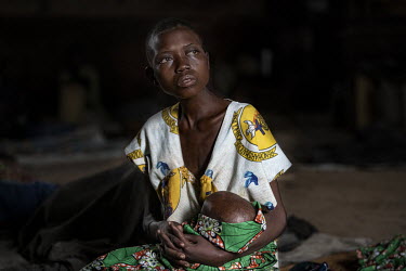 Claudine Andriane and her baby Isaac in a disused church along with several hundred other IDPs in Drodro where at least 20,000 displaced people are living.  There are at least 5.5 million internally d...