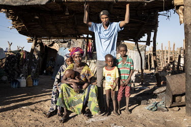 Djenneba Fall (27) and her family, who are from a village in the Bankass Circle but are now in an IDP camp in Bamako.  Thousands of Fulani (semi-nomadic herders of the Sahel) have been displaced by fi...