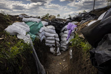 Sandbags protect the entrance to an Ukrainian frontline position near the village of Vilne Pole.