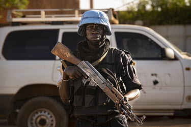 An UN Police patrol supporting local police and troops.  In 2012, Islamist radicals linked to al-Qaeda, hijacked an uprising by ethnic Tuareg people and went on to seize cities across northern Mali. A...