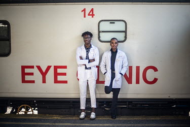 Optometry students Anele Shabalala (l) and Ntsindiso Bidla (r) outside the Eye Clinic carriage on the last day of their two week stay on the Phelophepa healthcare train in Kroonstad, South Africa. The...