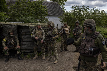 Ukrainian soldiers from the Zaporizhzhia territorial defence force stationed in the recently recaptured village of Novopil.