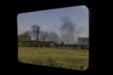 Fires burn at the Lysychansk oil refinery.