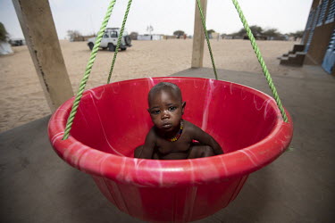 A malnourished childr is weighed and measured at the WFP nutrition clinic in the Dar es Salaam Refugee camp.  Lake Chad, which spanned 9,652sqm in 1963, has shrunk by 90 per cent in recent decades. Cl...