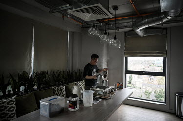 Eric Wong makes his unique blend of milk tea, at the Sienna House apartment building where he is setting up his business selling the tea after moving to the UK on a British National Overseas visa. The...