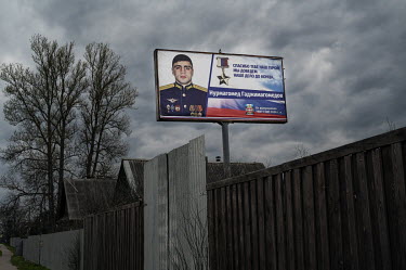 A publicity banner with a portrait of a deceased serviceman from Dagestan, Nurmagomed Gadzhimagomedov, which was erceted along the Moscow-St. Petersburg highway. He died on 24 February 2022 and was po...
