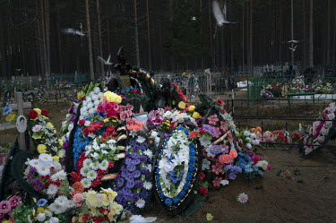 The grave of Kirill Nekrasov at the cemetery in his native village of Letnerechensky in the Republic of Karelia. Kirill (19) died on the first day of the war in Ukraine. He wanted to earn money dental...