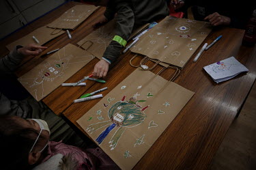Families take part in a creative workshop designed to help with mental health needs during the Spring Fun Festival at the Islington Chinese Association. The festival is helping Hong Kongers socialise...