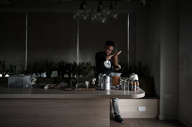 Eric Wong makes his unique blend of milk tea, at the Sienna House apartment building where he is setting up his business selling the tea after moving to the UK on a British National Overseas visa. The...