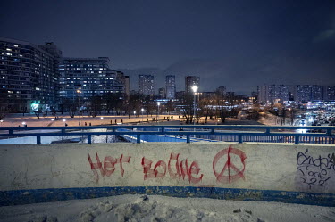 "No War' graffiti on a wall. Such inscriptions are painted over almost immediately after their appearance and 23 criminal cases have been opened under the article on vandalism for this kind of protest...