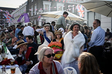 People enjoy a Platinum Jubilee street party commemorating 70 years on the throne for HRH Queen Elizabeth II.