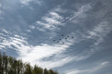 Planes fly in a Z formation during a Victory Day parade rehearsal.On the day of the parade, flights were cancelled in many Russian cities. According to the officials this was due to cloudy weather.
