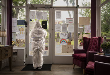 A of staff waiting for visitors at St Cecilia's Nursing Home where socially distanced visits have started for the first time since it closed its doors to visitors on 11 March 2020.