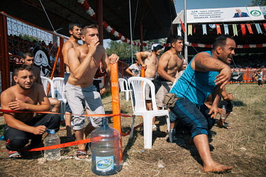 Fans look on and shout to their favourite competitor at the Kirkpinar National Final for Oil Wrestling, the national sport of Turkey. Thousands of fans come to spectate annually despite the sport not...