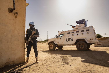 A patrol conducted by local police and UN troops in an armoured vehicle.  In 2012, Islamist radicals linked to al-Qaeda, hijacked an uprising by ethnic Tuareg people and went on to seize cities across...