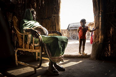 A pregnant woman with a child.  Since the end of 2013, conflict has cost almost 400,000 lives and left six million people, of a population of 11 million, desperately hungry. Only 40% of South Sudan's...