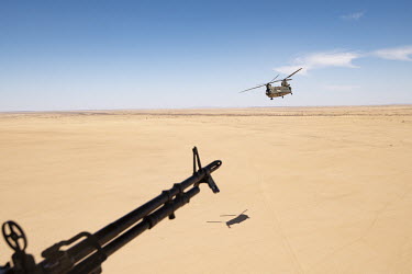 An RAF flight over the desert, part of Operation NEWCOMBE CH47, the codename for British military assistance to France's Operation Barkhane. NEWCOMBE consists of three Royal Air Force Chinook helicopt...