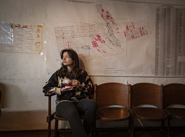 Anna Sirko sits in the office of a wheat farm in the Odessa Oblast. A map of the land they farm is displayed on the wall behind her.  Ukraine produces almost 12% of the wheat in the global export mark...