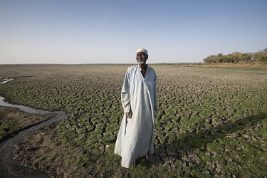 Adam Abdullah (75) lives on the edge of the rapidly diminishing Lake Chad on the outskirts of Melea. A decade ago his cattle died in a famine. "There used to be water all around here, but I have watch...