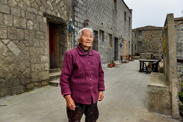 Mrs Wang (88) has lived in Qinbi Village all her life. Qinbi is a cluster of traditional Fujianese-style stone houses, home to fishermen and smugglers, that have been renovated over the past 25 years...