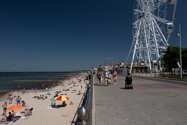 Tourists relax on the beaches and promenade on the Baltic Sea in Zelenogradsk.