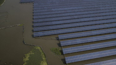 Photovoltaic panels in a lake at an aqua solar farm. China is the world's largest solar power producer.