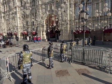 Riot police stand behind barricades blocking off Red Square which was closed on the 6 March and 8 March 2022.