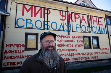 'Peace to Ukraine, Freedom to Russia', written on the front of the commercial building of Dmitry Skurikhin, an entrepreneur and activist in the village of Russko-Vysotskoye near St. Petersburg. Dmitry...