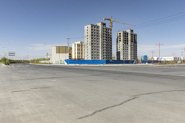 New apartment buildings. Golmud, the third largest city on the Tibetan plateau, is developing as a key Chinese military staging point for nearby the autonomous regions Tibet and Xinjiang.