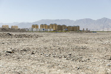 New apartment buildings stand in the Gobi desert in Golmud. Golmud, the third largest city on the Tibetan plateau, is developing as a key Chinese military staging point for nearby the autonomous regio...
