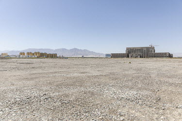 A new government building construction stand in the Gobi desert in Golmud. Golmud, the third largest city on the Tibetan plateau, is developing as a key Chinese military staging point for nearby the a...