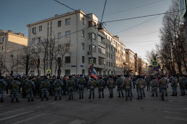 Police line the street as people from organisations financed by government make their way to the Luzhniki Statdium for a concert and rally to support the so-called 'special operation' in Ukraine. It h...